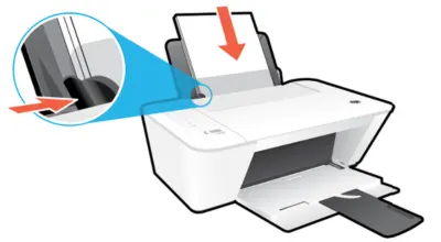 Carga papel en la impresora.